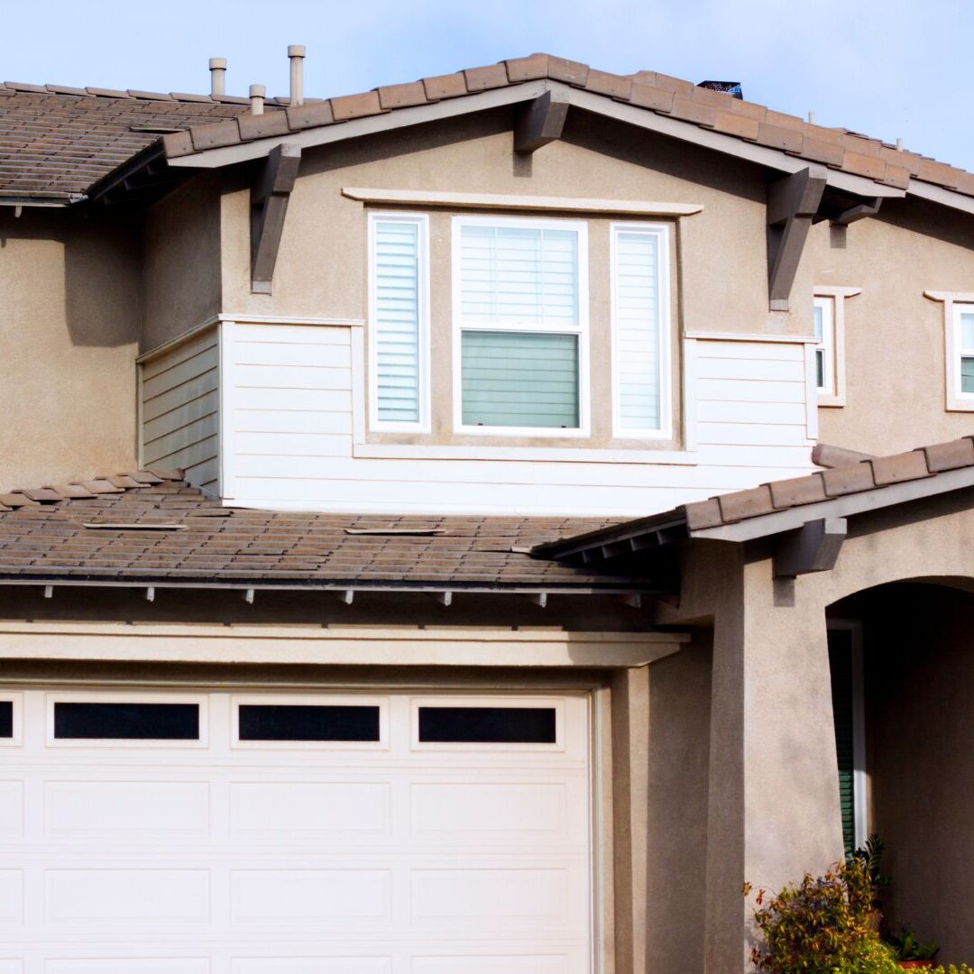 Stucco Home Exterior and Blue Sky Stucco Home Exterior and Blue Sky